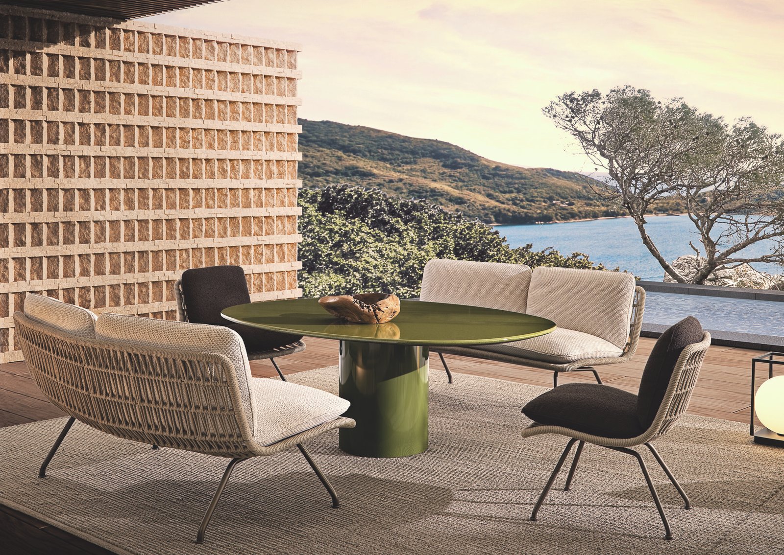 Oval lava stone outdoor table with stainless steel base